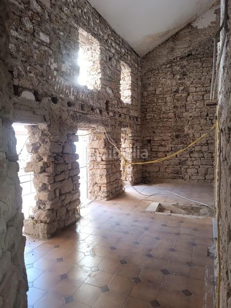 Foto 1944d541-3edc-42d3-9dac-861cb038ee32. Casa aparellada amb calefacció aparcament a Baeza