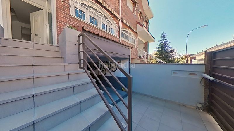 Foto 0c8d973e-2de3-4c38-8fa3-1404c98fe83e. Casa aparellada amb calefacció aparcament piscina a Alcorcón
