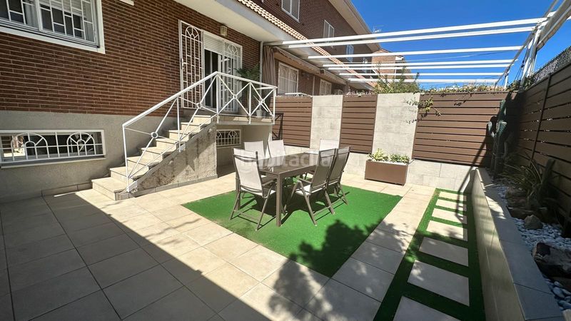 Foto 596087ac-014b-4ae2-b000-d366db85e1b0. Casa aparellada amb calefacció aparcament piscina a Alcorcón