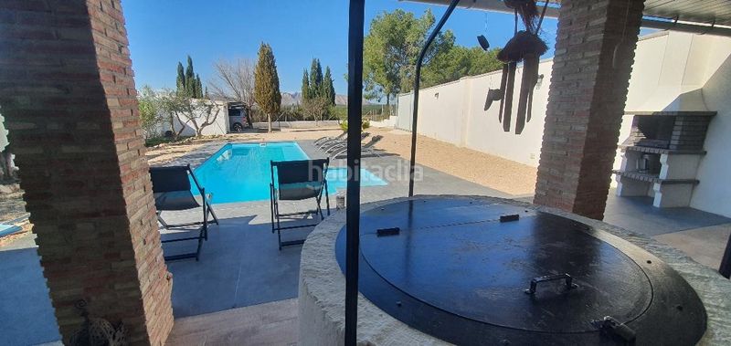 Foto 5a75c7c2-4432-4188-97ad-b7c1216ca8ec. Casa aparellada amb calefacció aparcament piscina a Hellín