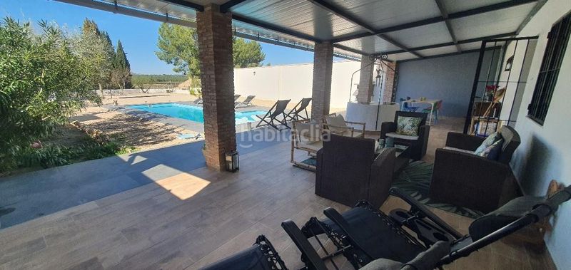 Foto cc4656d8-eebf-4b85-a565-62c1a1c2a5f7. Casa aparellada amb calefacció aparcament piscina a Hellín