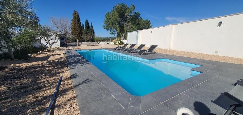 Foto d633f369-ba53-4dfa-9dcc-45ec873bea0a. Casa aparellada amb calefacció aparcament piscina a Hellín