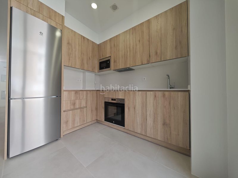 Foto fbde2d29-e89f-4d0d-ad03-9549eb80f58c. Planta baixa amb calefacció a Bellas Vistas Madrid