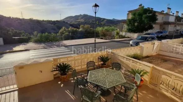 Foto 706a0143-91e2-43a3-b84f-28b0594f2aac. Casa aparellada amb calefacció aparcament a Huércal - Overa