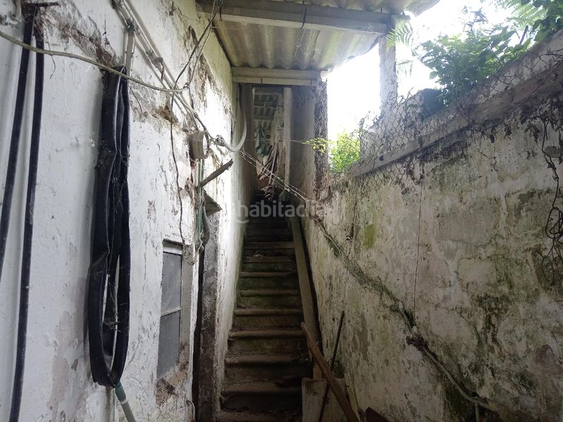 Foto f0718963-e503-4b51-8e73-873fb45ae1f6. Casa aparellada a Cee