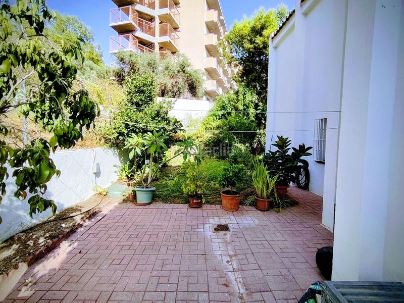 Foto 1df32c59-c2db-439e-98f0-397922c79c39. Casa aparellada amb aparcament a Pinares de San Antón Málaga