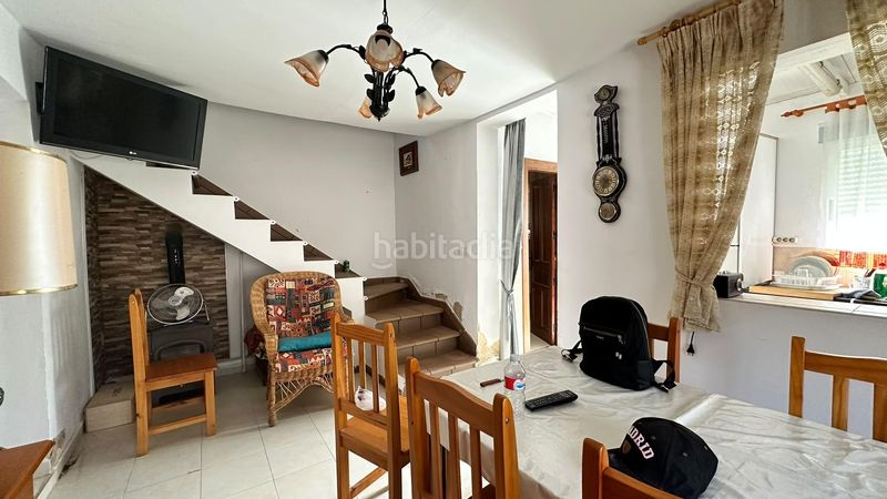 Foto 145adce2-a2fd-4f1d-95ee-aabc20899b8a. Chalet fachada de cemento con revestimiento de piedra en Pinarnegrillo