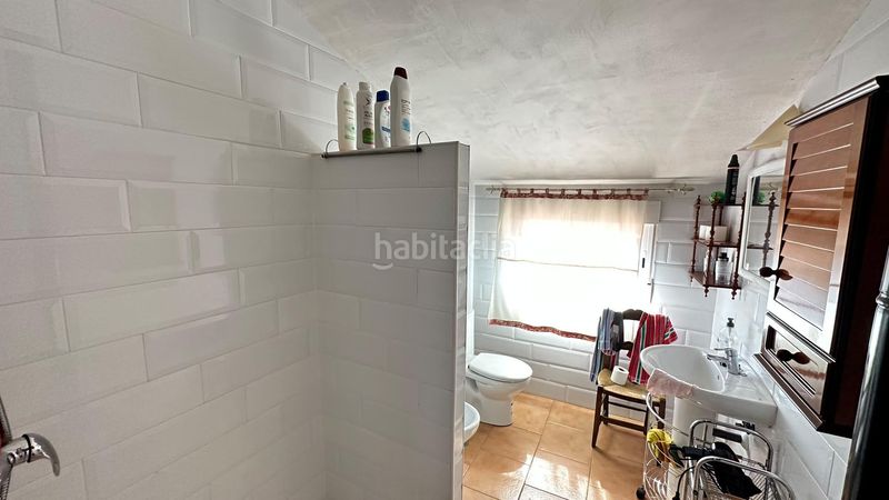 Foto 4fdf5f85-9794-4d1e-985a-1f760e8d5972. Chalet fachada de cemento con revestimiento de piedra en Pinarnegrillo