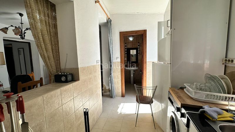 Foto c3a49698-efbc-408b-97b8-afd8147131b7. Chalet fachada de cemento con revestimiento de piedra en Pinarnegrillo