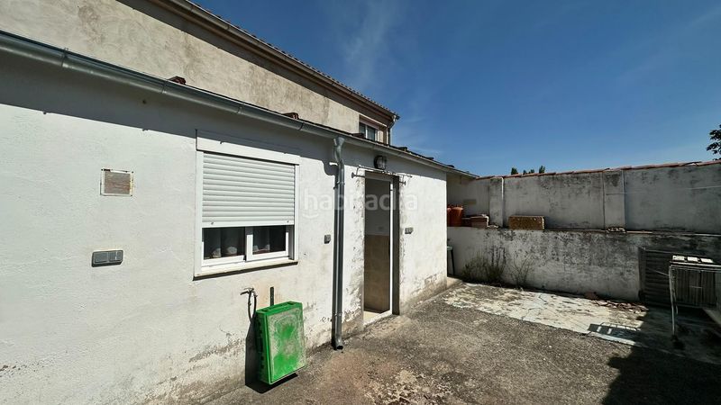 Foto f7393b58-4e13-4763-9b3b-265f8f3a1680. Chalet fachada de cemento con revestimiento de piedra en Pinarnegrillo