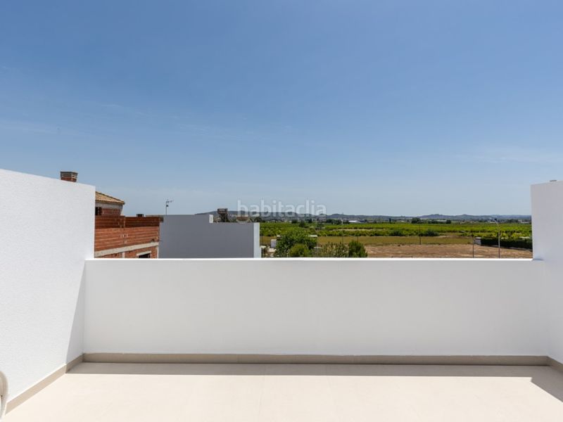 Foto 1045eb78-c2b5-46ea-9b11-1ed21149d258. Casa aparellada amb piscina a Rafal