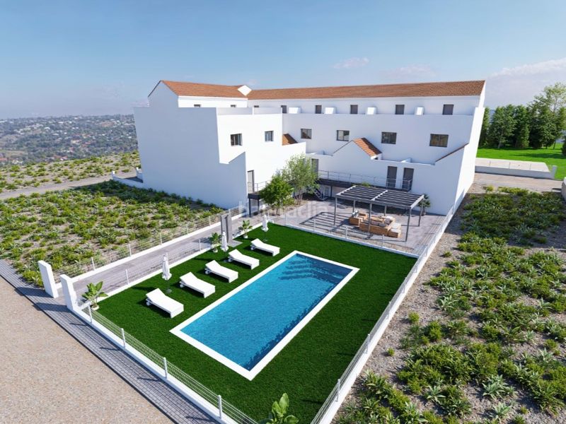 Foto b68de6f7-e678-46c0-8bb6-cdc0e8b9ce8b. Casa aparellada amb piscina a Rafal