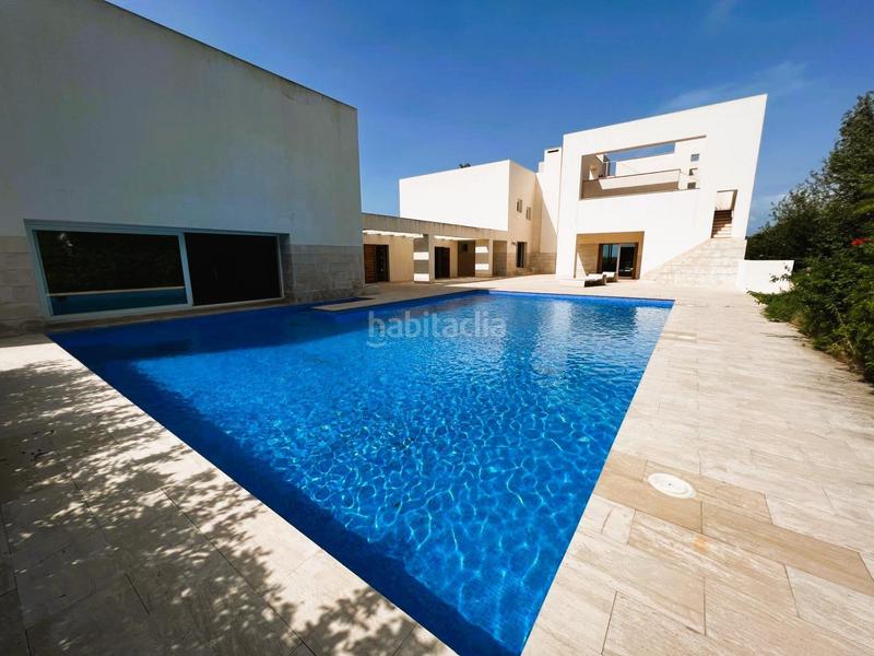 Foto 9a988356-af9c-45fe-b9cb-70e8da0ce4fd. Chalet mit heizung parking pool in Las Rotas / Les Rotes Dénia