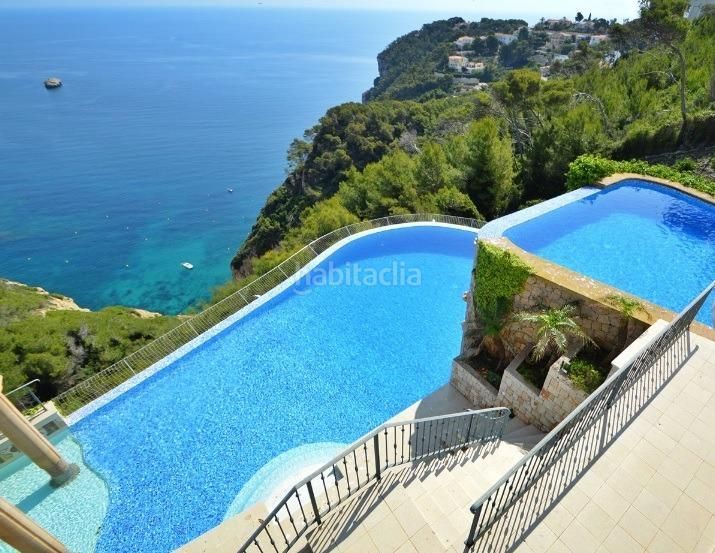 Foto 6c8c4b6a-f7d3-4a20-87b8-b3d754f3c08c. Xalet amb aparcament piscina a Portichol-Balcón al Mar Xàbia