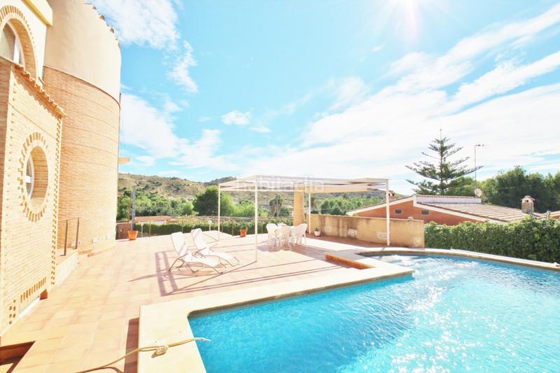 Foto c32a5a6f-75c7-4596-ba55-5b2133e2d759. Chalet excelente diseño, orientación, clima, luminosidad, materiales de alta calidad. rebajado en Busot