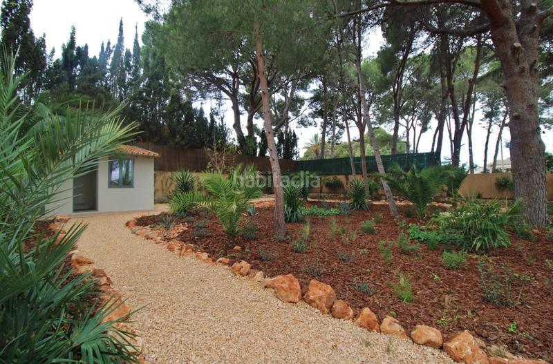 Foto 05d4b64c-0f23-4aec-92e6-b99ca256bac8. Chalet mit parking pool in Las Rotas / Les Rotes Dénia