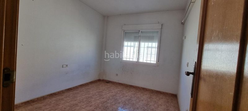 Foto cc9fbe06-7fd2-44ff-b1de-966378f10736. Casa adossada amb aparcament a El Esparragal Murcia
