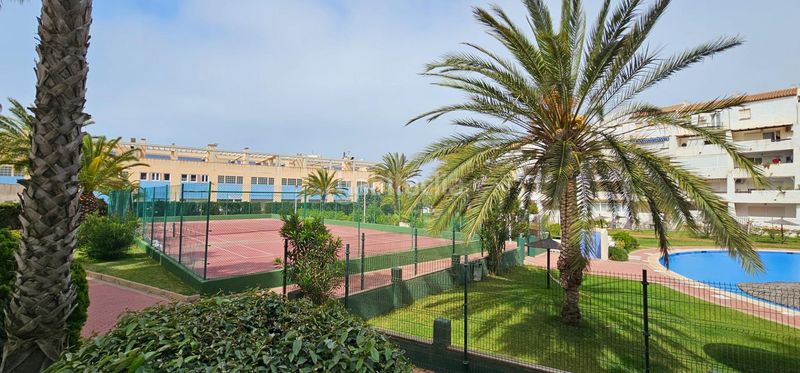 Foto 0d886fb2-2ef9-4e28-a8c3-f5562fff2522. Apartamento  en urbanización privada con pistas deportivas, piscina y preciosos jardines en Manga del Mar Menor (La)