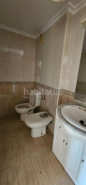 Foto b9df804c-a62c-48c2-8f10-5b0a59e75931. Apartamento  en urbanización privada con pistas deportivas, piscina y preciosos jardines en Manga del Mar Menor (La)