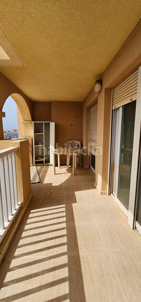 Foto c9f3e42d-b9fc-4eef-bf6a-64f61ef4750b. Apartamento  en urbanización privada con pistas deportivas, piscina y preciosos jardines en Manga del Mar Menor (La)