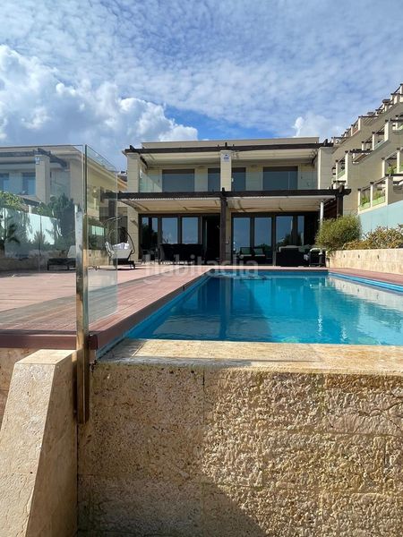 Foto 7288ed39-f36a-40f5-a906-bcf432292e35. Rent chalet with heating parking pool in Los Arenales del Sol Elche / Elx