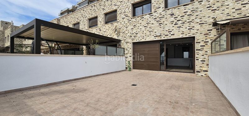 Foto c3816925-beb6-4bc3-88a0-d9fb7dd4755d. Casa amb calefacció aparcament piscina a Los Arenales del Sol Elche / Elx