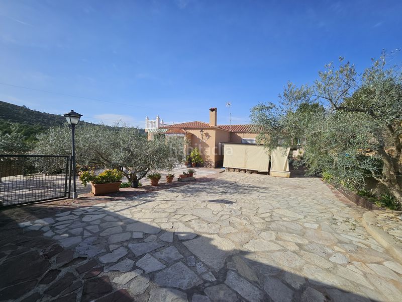 Foto c83383bb-f3d7-4015-9405-6ddf70c606fa. Xalet amb xemeneia aparcament piscina a Alcora (l´)