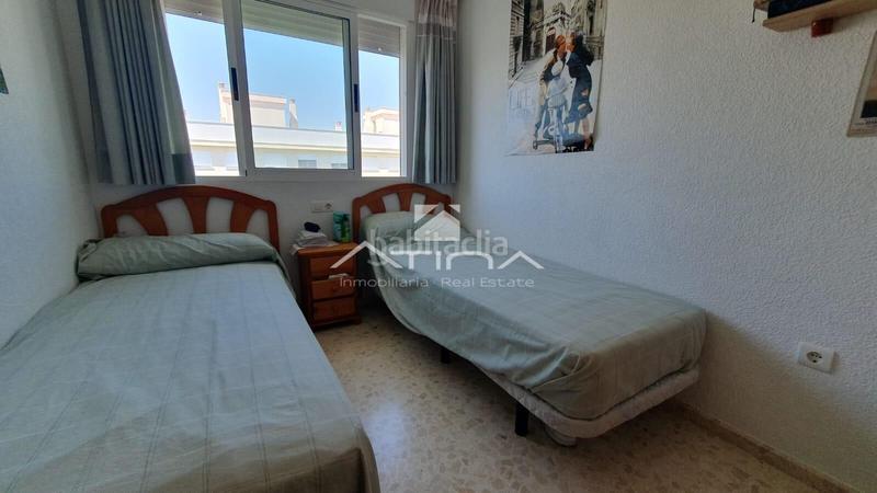Foto 451cdc7d-06a3-4f9b-9ea7-a50a2c9a36f5. Apartamento encantador apartamento, ubicado en la tercera línea de la playa y a solo 150 metros del mar en Daimús