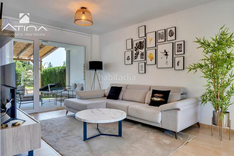 Foto 374f0530-cd61-4ccd-81d1-45b7630c9536. Casa adosada adosado de 3 plantas con jardín, pérgola, suite con terraza y piscina comunitaria en Xàbia