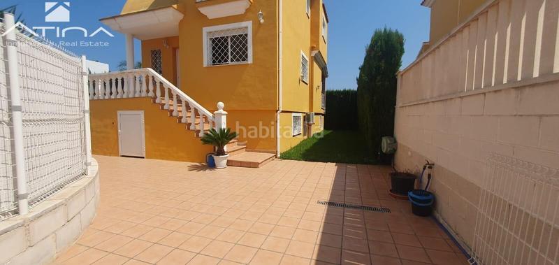 Foto 60c5eea7-7d8d-4f5e-bd25-68c04fb0f1e0. Chalet chale situado a 700m del mar entre la playa y el pueblo en Daimús