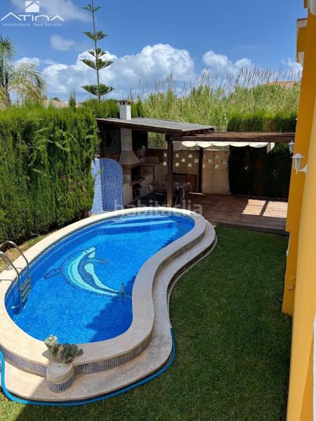 Foto 64deaa09-4b92-49f0-a284-c06d67110110. Chalet chale situado a 700m del mar entre la playa y el pueblo en Daimús
