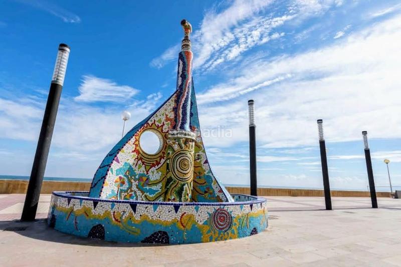 Foto 50bf5a24-396a-4c67-856d-fb151d0f7243. Planta baja viva el encanto del mediterráneo a solo unos pasos de la arena, en tercera línea playa en Daimús