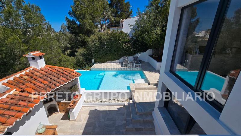 Foto a1ed8298-db2b-49a6-8e72-7dfe4969825a. Chalet avec chauffage parking piscine dans La Pedrera-Vessanes Dénia