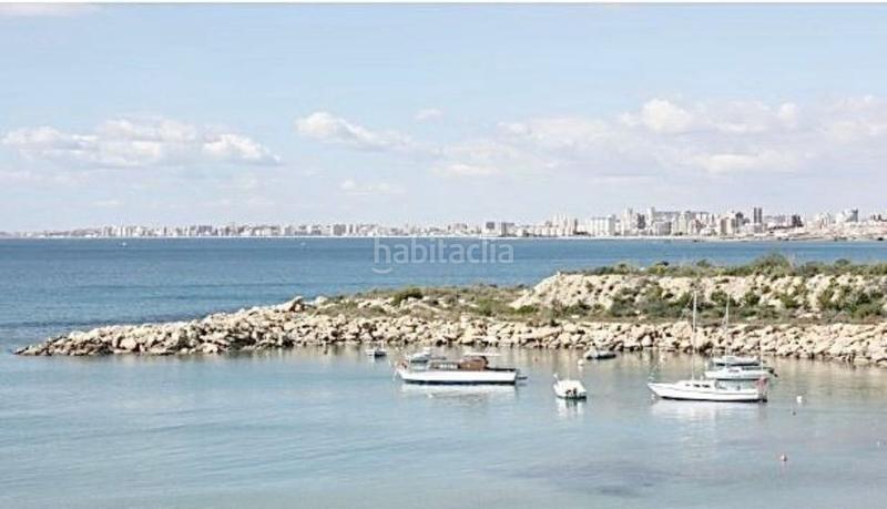 Foto c3cce324-a885-4a1a-af5d-b47bda7ade31. Chalet avec piscine dans Pueblo Acantilado-Lanuza Campello (el)