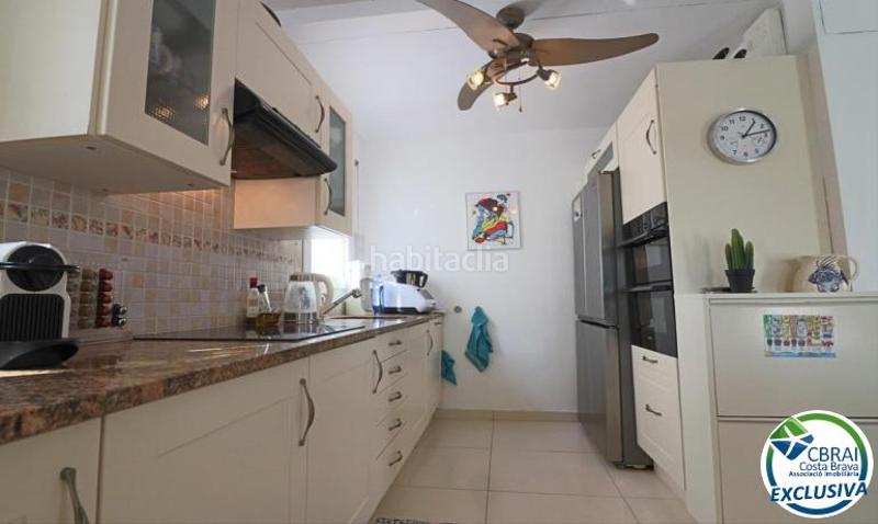 Foto 71d177e9-d3e7-4b0a-ae57-610512ced820. House with heating parking in Cap Ras - Creus - Falconera Empuriabrava