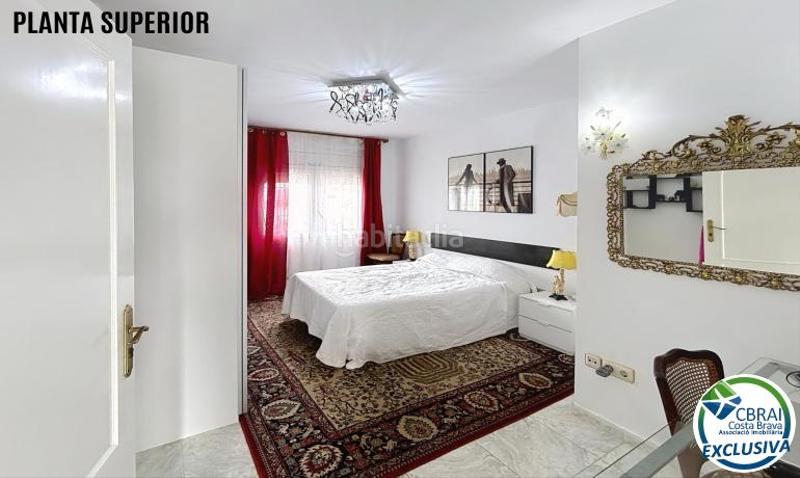 Foto ca4f879e-eb45-4154-a1d3-bdf1072ec5f6. Casa aparellada amb aparcament a Montgrí Empuriabrava