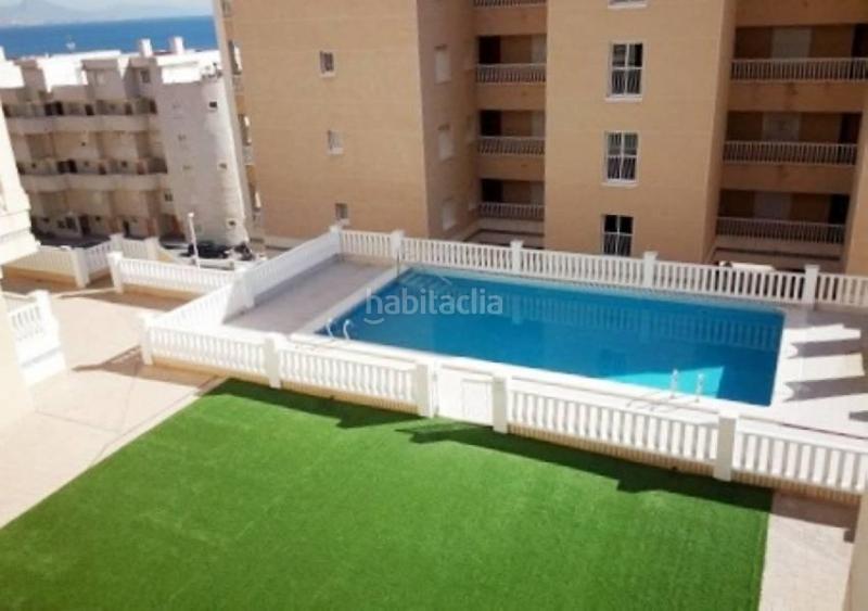 Foto a87c8ff4-9b48-42d2-a84c-1cc870849ef7. Piccolo appartamento con parcheggio piscina in Los Arenales del Sol Elche / Elx