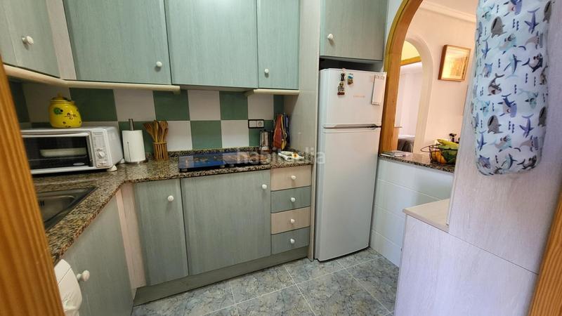 Foto e28ad0d6-cffd-408a-a7f1-c2d2ee535780. Piccolo appartamento con parcheggio piscina in Los Arenales del Sol Elche / Elx