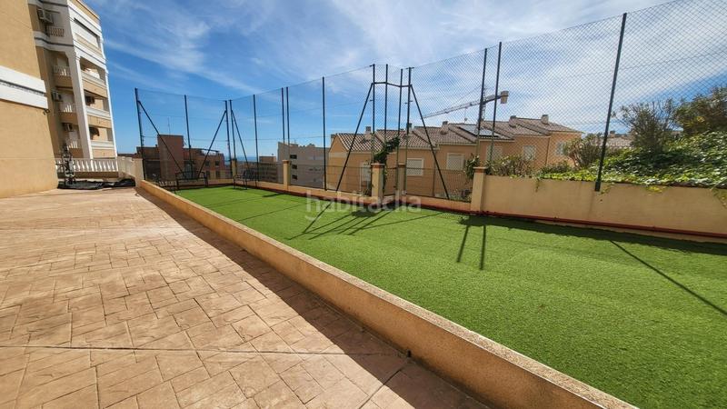 Foto 0a02cc3b-1fa8-4216-9719-d0fcd6c15617. Apartamento  bajo esquina de 2 dorm en urb con piscina y terraza y entrada independiente de la escalera común en Elche / Elx