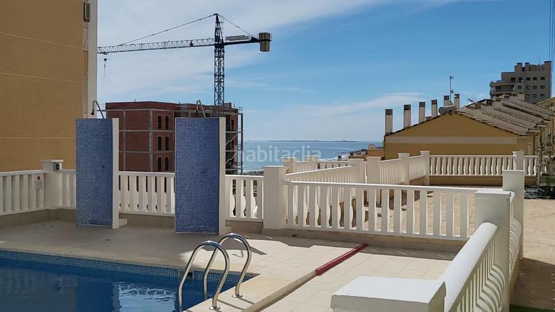 Foto 4583e07a-26fb-4e6c-a7b6-bd98c0c1e13f. Apartamento  bajo esquina de 2 dorm en urb con piscina y terraza y entrada independiente de la escalera común en Elche / Elx