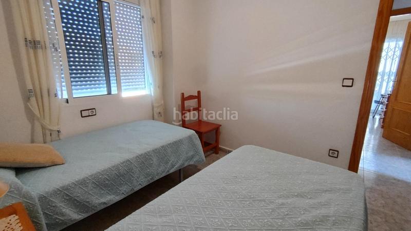 Foto 502f344c-e763-4ab4-bc25-ad590e4de577. Apartamento  bajo esquina de 2 dorm en urb con piscina y terraza y entrada independiente de la escalera común en Elche / Elx