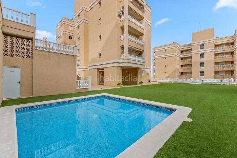Foto 54891dc6-a546-44f2-b12c-dd6673c7e351. Apartamento  bajo esquina de 2 dorm en urb con piscina y terraza y entrada independiente de la escalera común en Elche / Elx