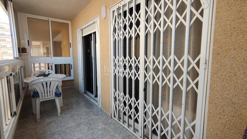 Foto 633a943e-2afc-4674-9765-7772701fdc6f. Apartamento  bajo esquina de 2 dorm en urb con piscina y terraza y entrada independiente de la escalera común en Elche / Elx