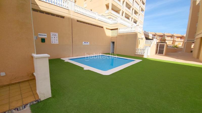 Foto 6be22e3b-d6cd-4390-b67b-5a56264bb949. Apartamento  bajo esquina de 2 dorm en urb con piscina y terraza y entrada independiente de la escalera común en Elche / Elx
