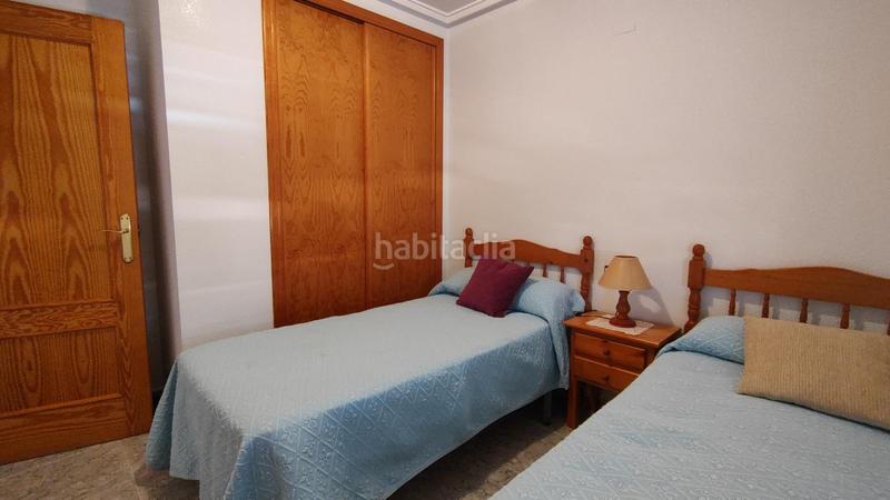 Foto 74dd8b0d-a010-4b08-ad81-220d271f4a9a. Apartamento  bajo esquina de 2 dorm en urb con piscina y terraza y entrada independiente de la escalera común en Elche / Elx