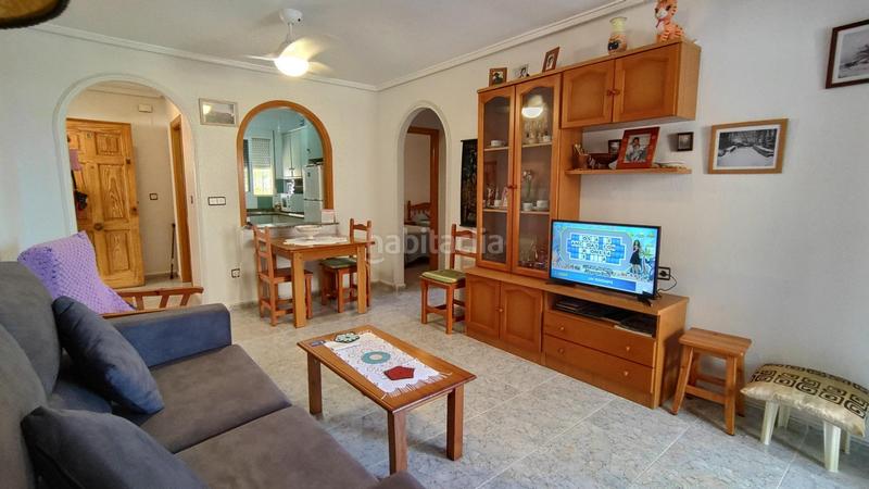 Foto 8fe3e020-d557-4948-b604-f8b46a1b46f8. Apartamento  bajo esquina de 2 dorm en urb con piscina y terraza y entrada independiente de la escalera común en Elche / Elx