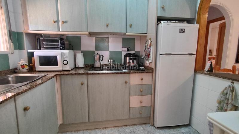 Foto a911bd6c-48a7-470e-9151-f1cf50fef986. Apartamento  bajo esquina de 2 dorm en urb con piscina y terraza y entrada independiente de la escalera común en Elche / Elx
