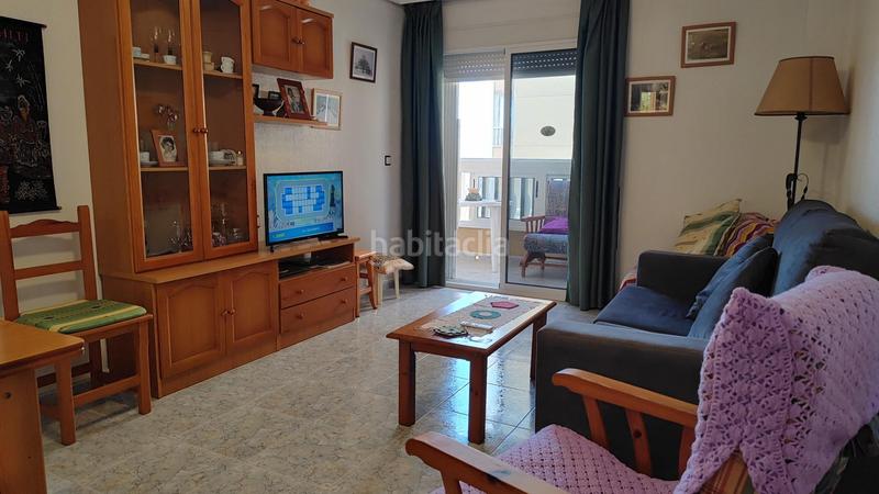 Foto d06ea9b4-fdc3-40e3-8fbe-a6e3ccb8c854. Apartamento  bajo esquina de 2 dorm en urb con piscina y terraza y entrada independiente de la escalera común en Elche / Elx