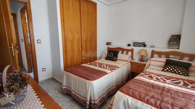 Foto db0ddf3d-7d5f-4b51-a554-3ac6f0e3a879. Apartamento  bajo esquina de 2 dorm en urb con piscina y terraza y entrada independiente de la escalera común en Elche / Elx