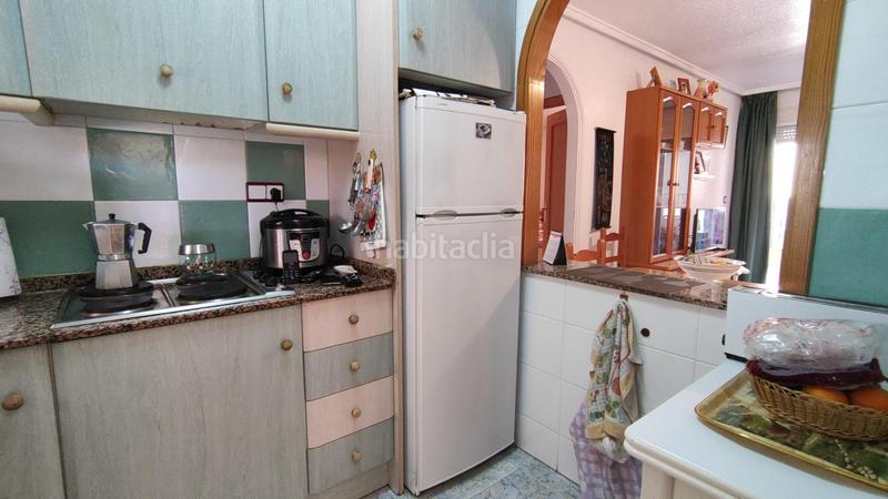 Foto de559e8b-e760-442d-b199-bff82c9b95f7. Apartamento  bajo esquina de 2 dorm en urb con piscina y terraza y entrada independiente de la escalera común en Elche / Elx